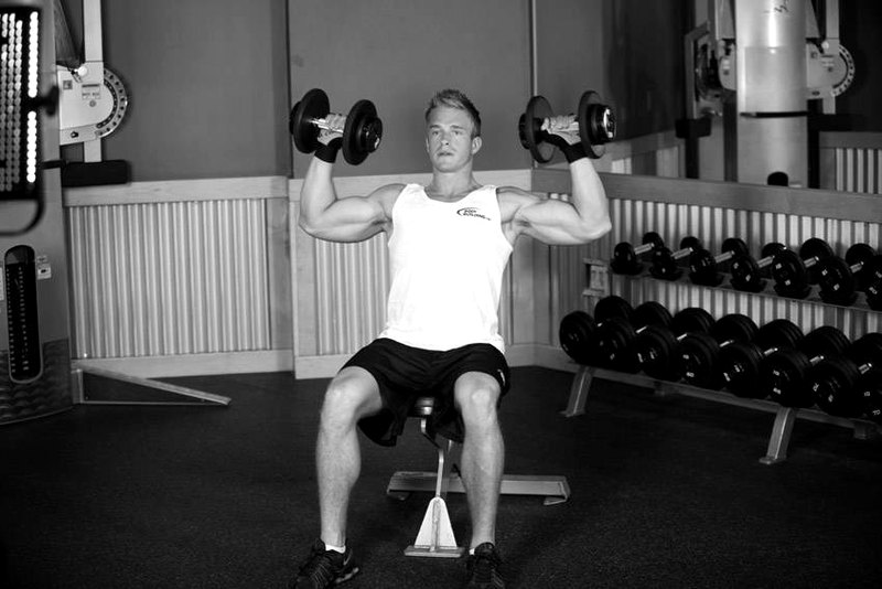 Seated Dumbbell Press — end position demonstration photo