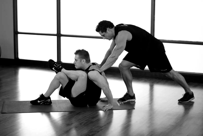 Seated Glute — end position demonstration photo