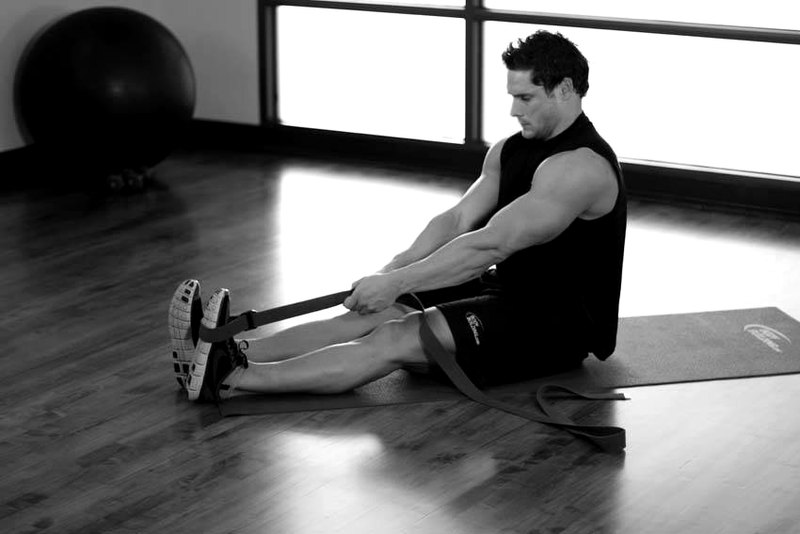 Seated Hamstring and Calf Stretch — end position demonstration photo