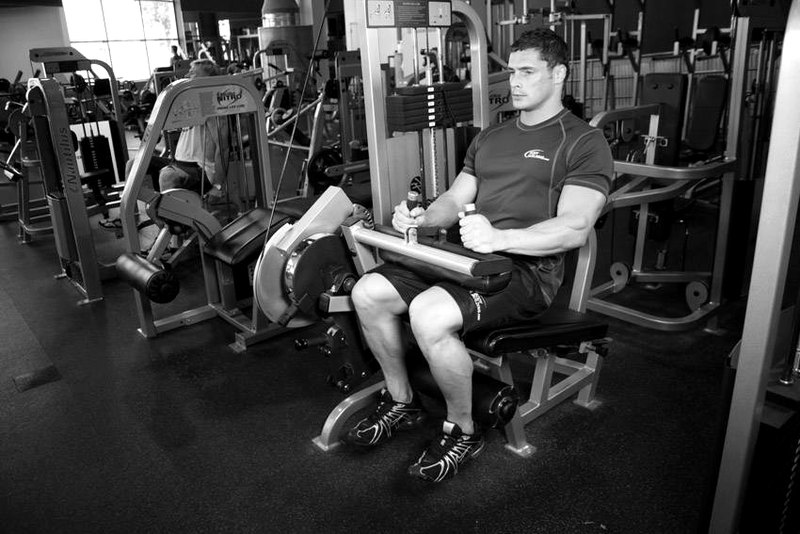 Seated Leg Curl — end position demonstration photo