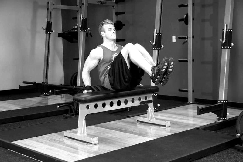 Seated Leg Tucks — start position demonstration photo