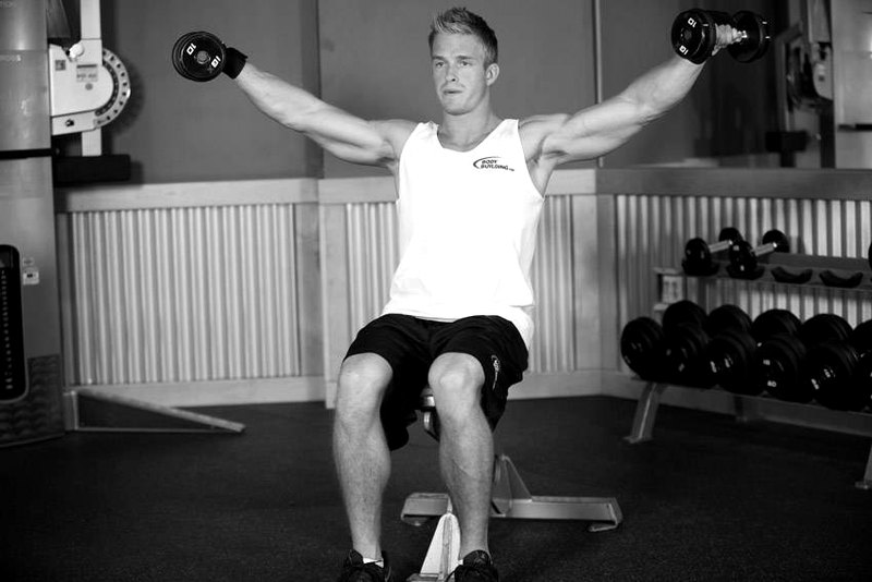 Seated Side Lateral Raise — end position demonstration photo