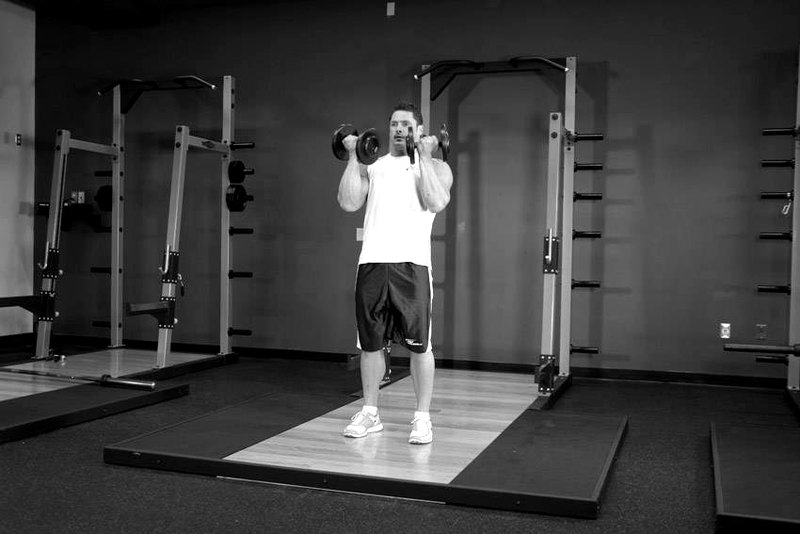 See-Saw Press (Alternating Side Press) — start position demonstration photo