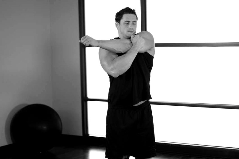 Shoulder Stretch — end position demonstration photo