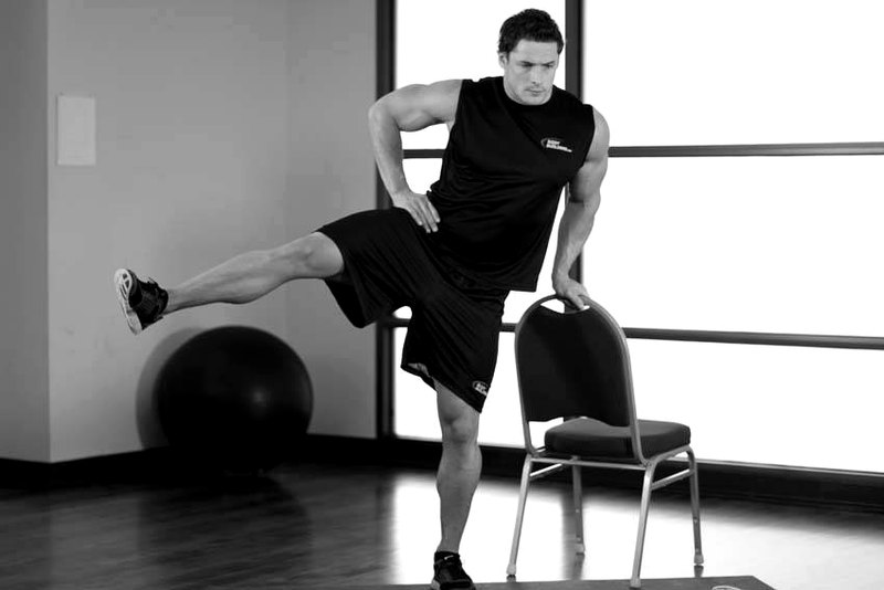 Side Leg Raises — end position demonstration photo