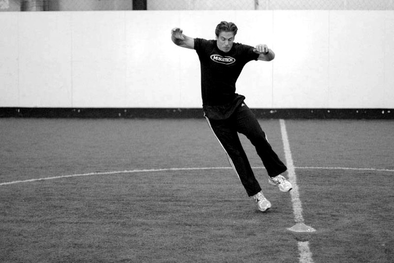 Side Standing Long Jump — end position demonstration photo