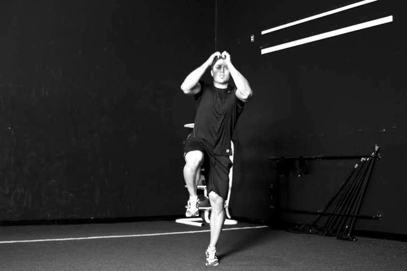 Single Leg Butt Kick — end position demonstration photo