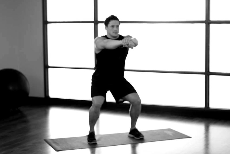 Sit Squats — end position demonstration photo