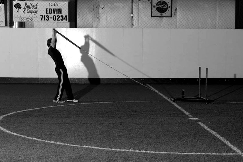 Sled Overhead Backward Walk — start position demonstration photo