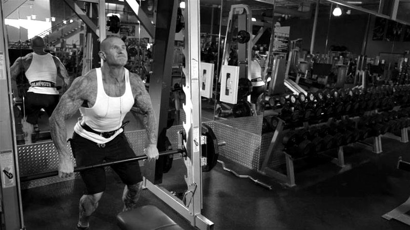 Smith Machine Hang Power Clean — end position demonstration photo