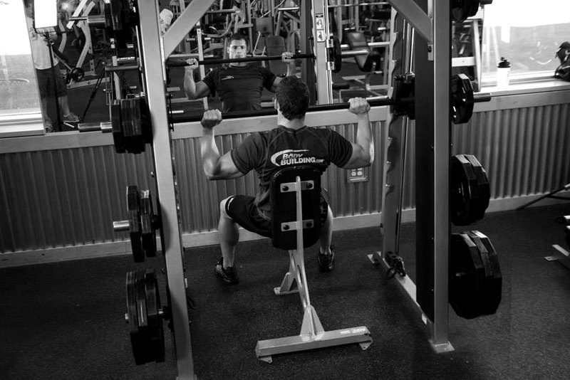 Smith Machine Overhead Shoulder Press — start position demonstration photo