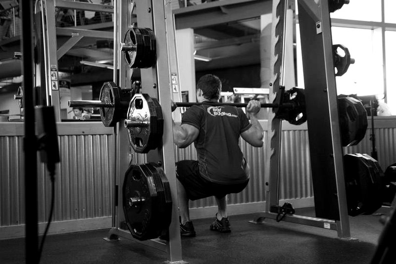 Smith Machine Squat — start position demonstration photo