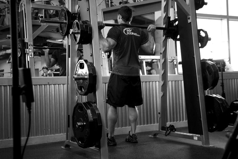 Smith Machine Squat — end position demonstration photo