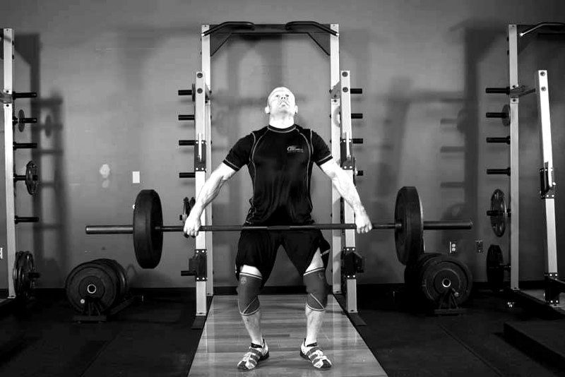 Split Snatch — end position demonstration photo