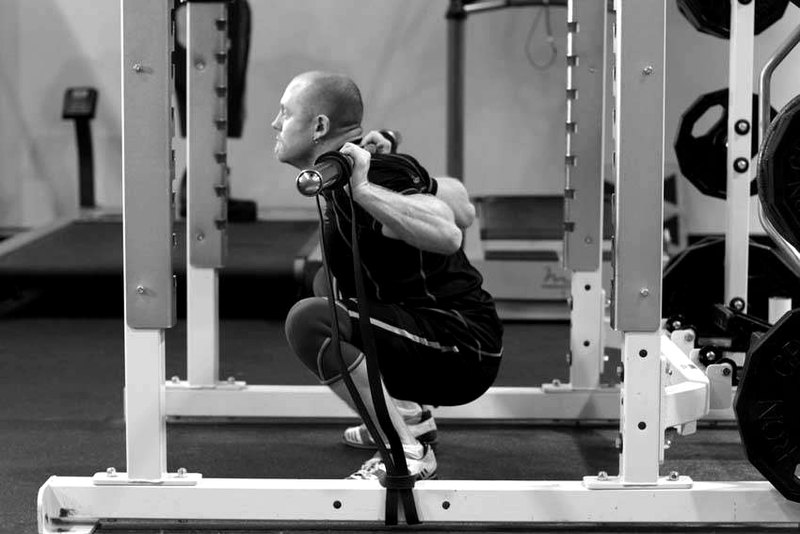 Squat with Bands — end position demonstration photo