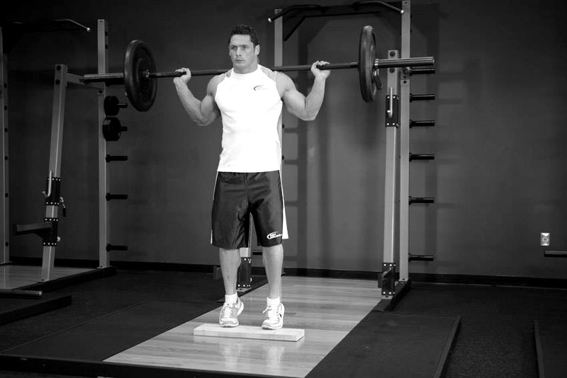 Standing Barbell Calf Raise — start position demonstration photo