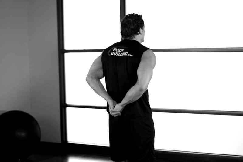 Standing Biceps Stretch — start position demonstration photo