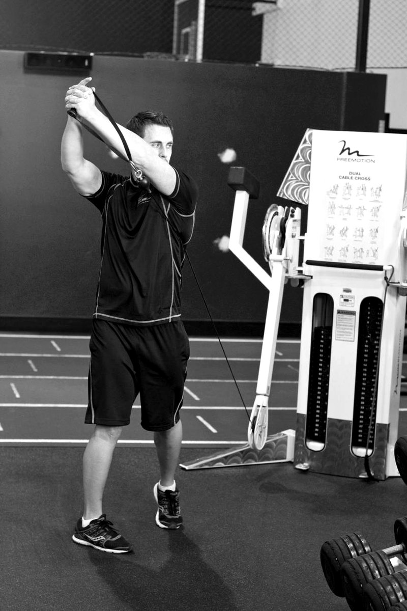 Standing Cable Lift — end position demonstration photo