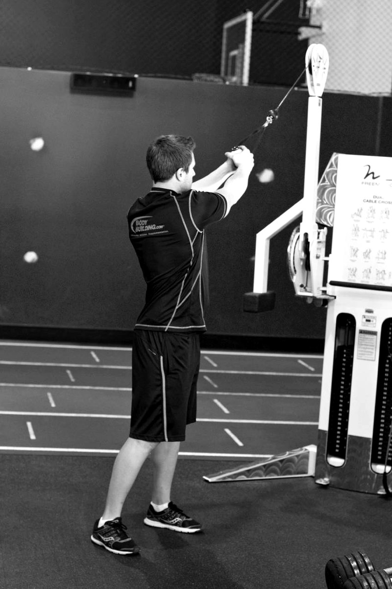 Standing Cable Wood Chop — start position demonstration photo