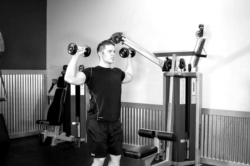 Standing Dumbbell Press — start position demonstration photo