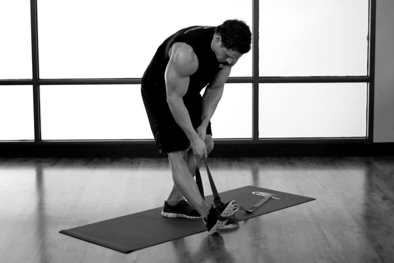 Standing Hamstring and Calf Stretch — start position demonstration photo