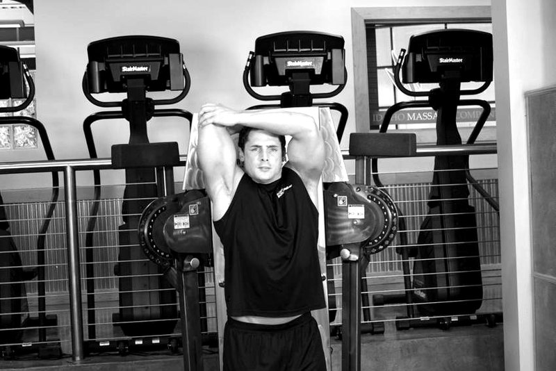 Standing Low-Pulley One-Arm Triceps Extension — start position demonstration photo