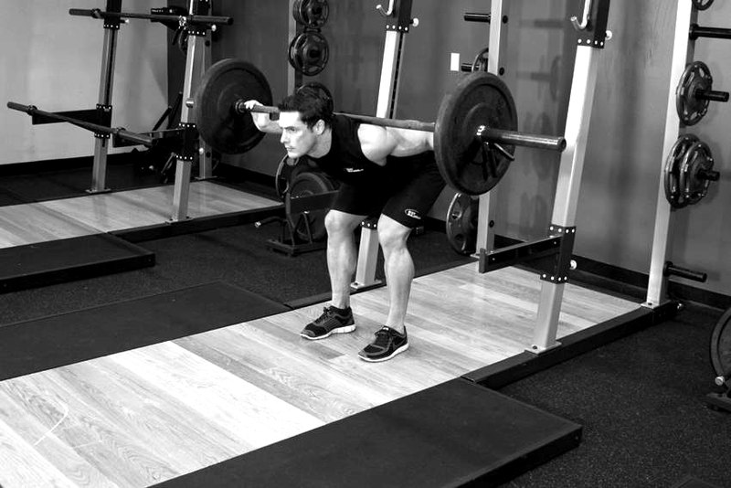 Stiff Leg Barbell Good Morning — end position demonstration photo
