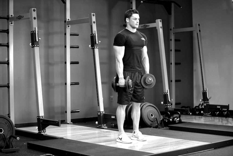 Stiff-Legged Dumbbell Deadlift — start position demonstration photo