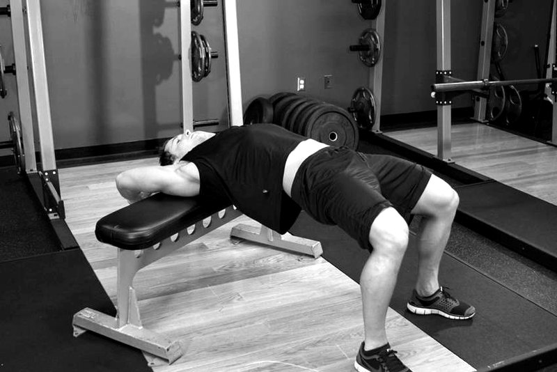 Straight-Arm Dumbbell Pullover — end position demonstration photo