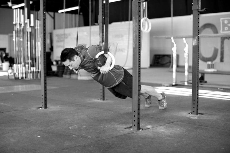 Suspended Push-Up — start position demonstration photo