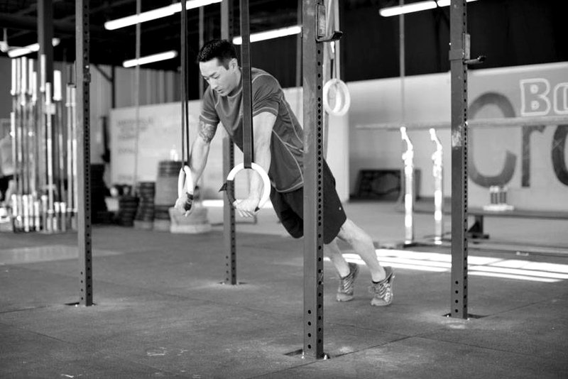 Suspended Push-Up — end position demonstration photo