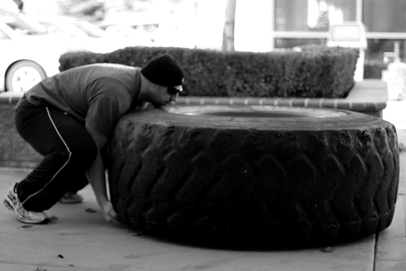 Tire Flip — start position demonstration photo