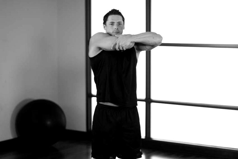 Tricep Side Stretch — end position demonstration photo