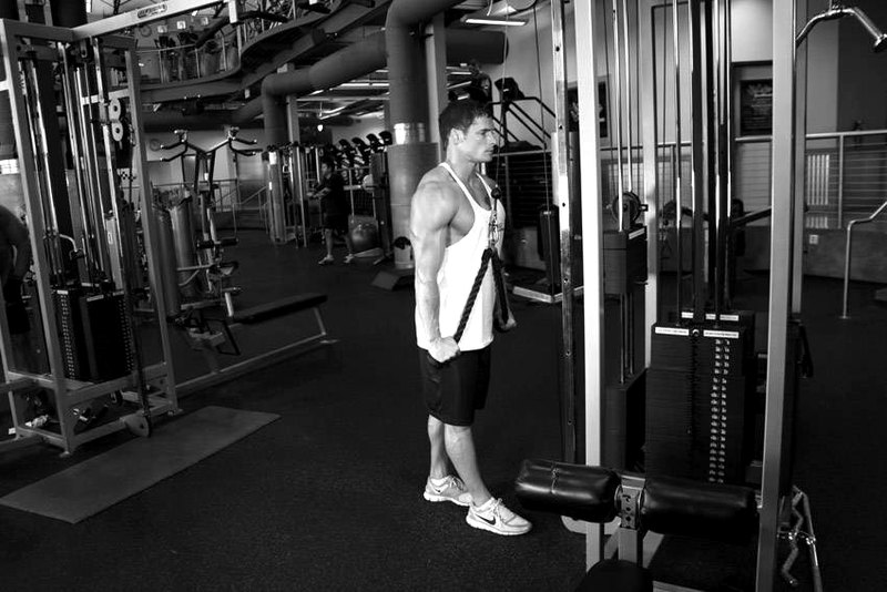 Triceps Pushdown - Rope Attachment — end position demonstration photo