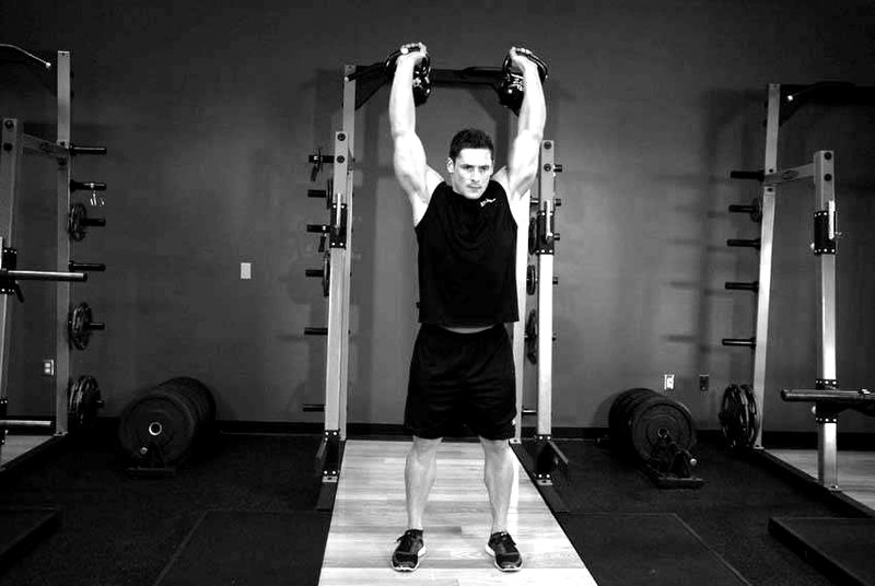 Two-Arm Kettlebell Military Press — end position demonstration photo