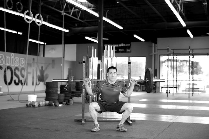 Weighted Jump Squat — end position demonstration photo
