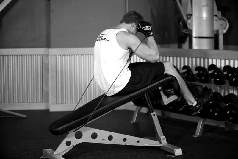 Weighted Sit-Ups - With Bands — end position demonstration photo