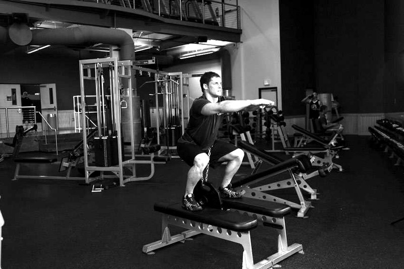 Weighted Squat — end position demonstration photo