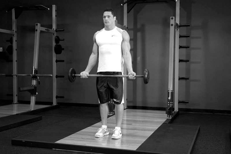 Wide-Grip Standing Barbell Curl — start position demonstration photo