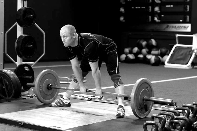 Wide Stance Stiff Legs — start position demonstration photo